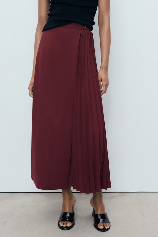 Pleated crossover skirt