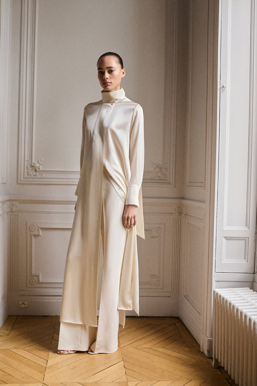 Cape-style silk dress with bow neck