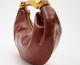 Handbag with metal handle
